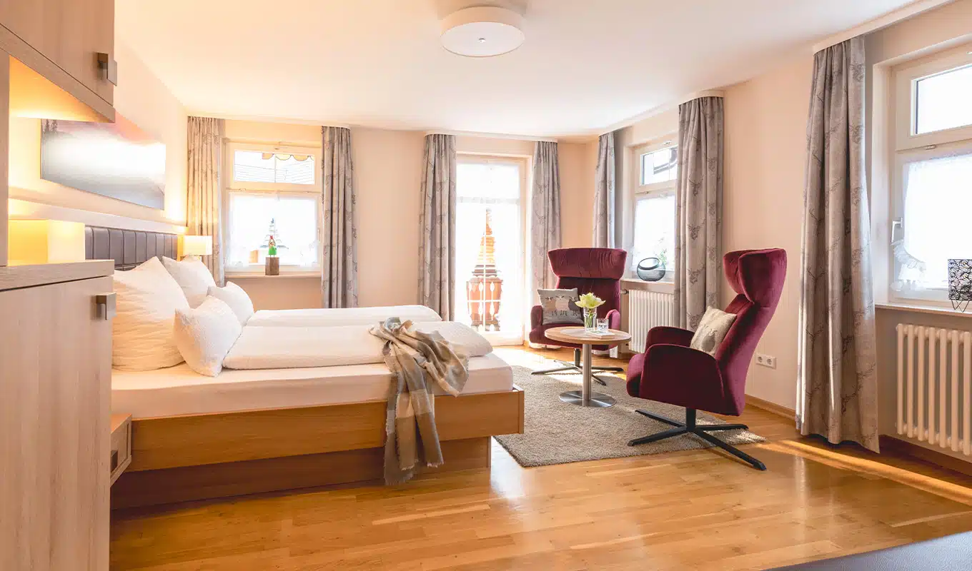 Wohlfühl-Doppelzimmer mit Balkon Schlafbereich